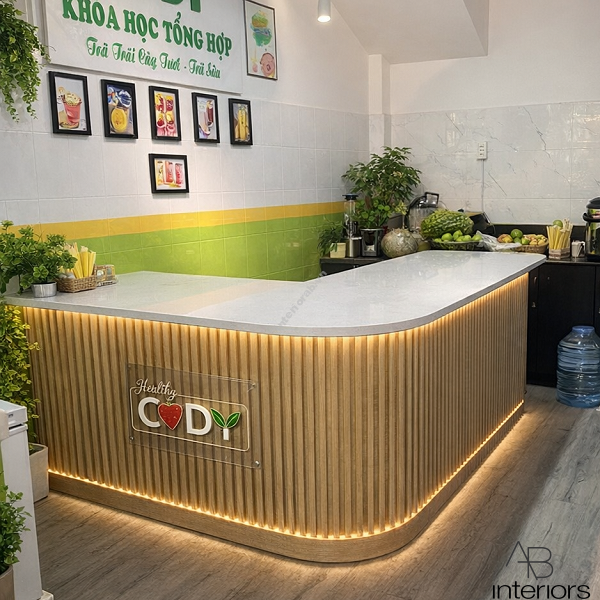 Quầy pha chế chữ L bo cong ốp lam sóng QB055